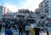 Airstrike Mystery Haunts Bureij Camp Rescue workers and civilians on collapsed building after earthquake
