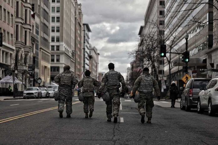 soldiers walking down a city street