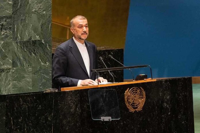 Speaker at United Nations podium delivering a address