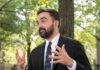 City Hall’s Influencer Machine Exposed Man in a suit gesturing while speaking outdoors