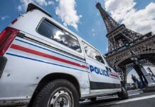 Police van near the Eiffel Tower
