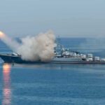 Navy’s $25K Bet Upends Air Defense Warship launching a missile at sea