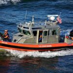 Rio Grande Ambush Sparks Federal Crackdown U.S. Coast Guard patrol boat speeding on open water
