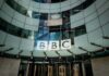 BBC Edit Bombshell – $10B Showdown Looms BBC headquarters entrance with curved glass facade