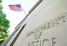 Chilling Border Plot – Judge Drops Hammer Department of Justice building with American flag