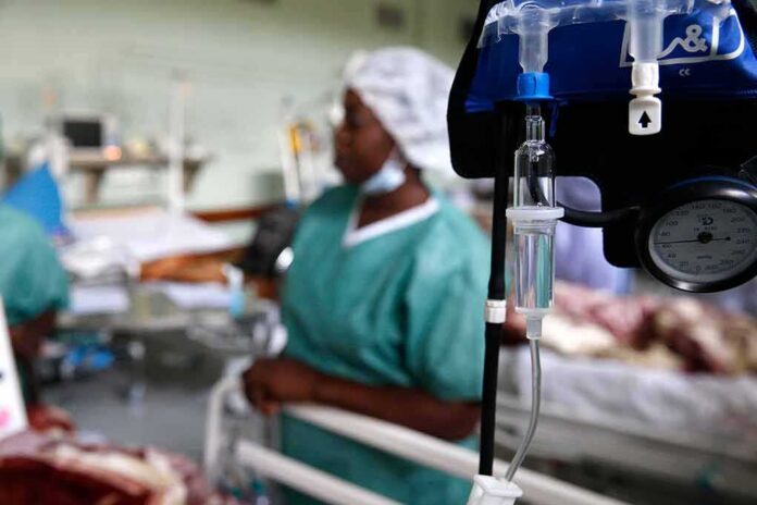 IV drip and blood pressure gauge in a hospital ward