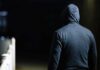 Masked Attackers Ambush TV Star person in a dark hoodie walking at night