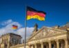 Robot Assault Probe Shocks Germany German flag flying above the Reichstag building