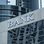 Treasury Watchdog Flags Ideology-Driven Denials Bank building facade with large sign and glass windows