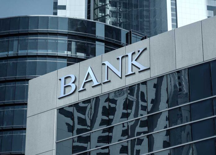Bank,Building Bank building facade with large sign and glass windows