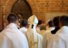 Mystery Growth Prompts Emergency Pope Operation Bishop in white mitre among clergy during church procession